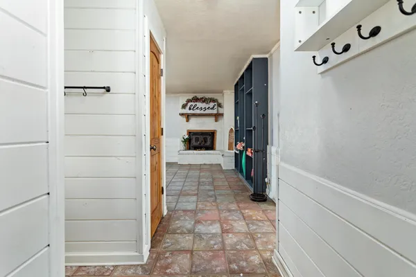 a view of a hallway with closet