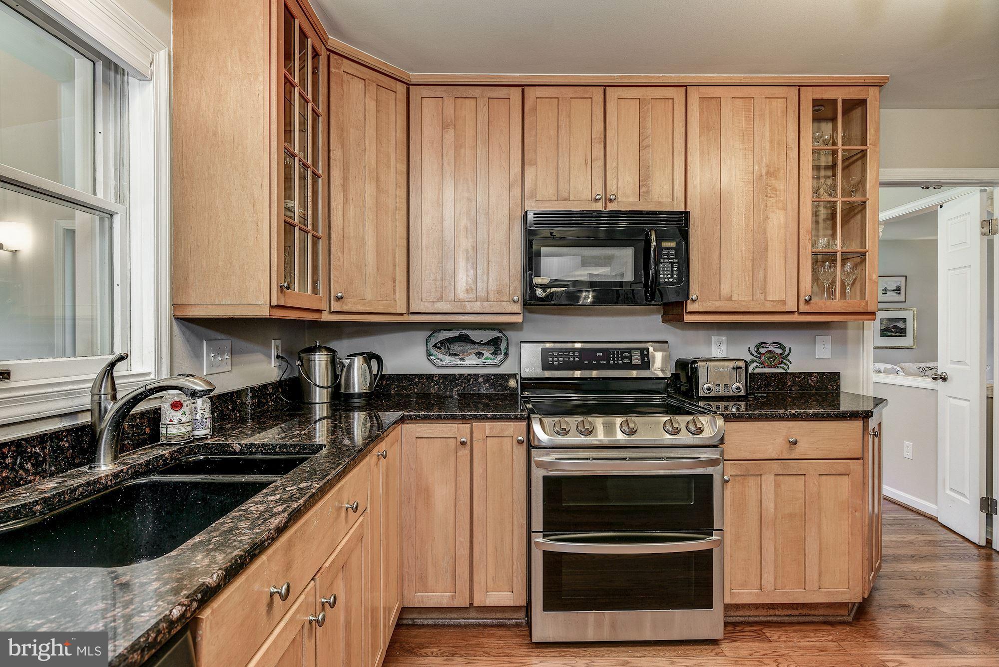 11912 Hall Shop Road Clarksville, MD 21029 - Photo 11 of 50 Upgraded Kitchen Open to Dining Room & Family Room