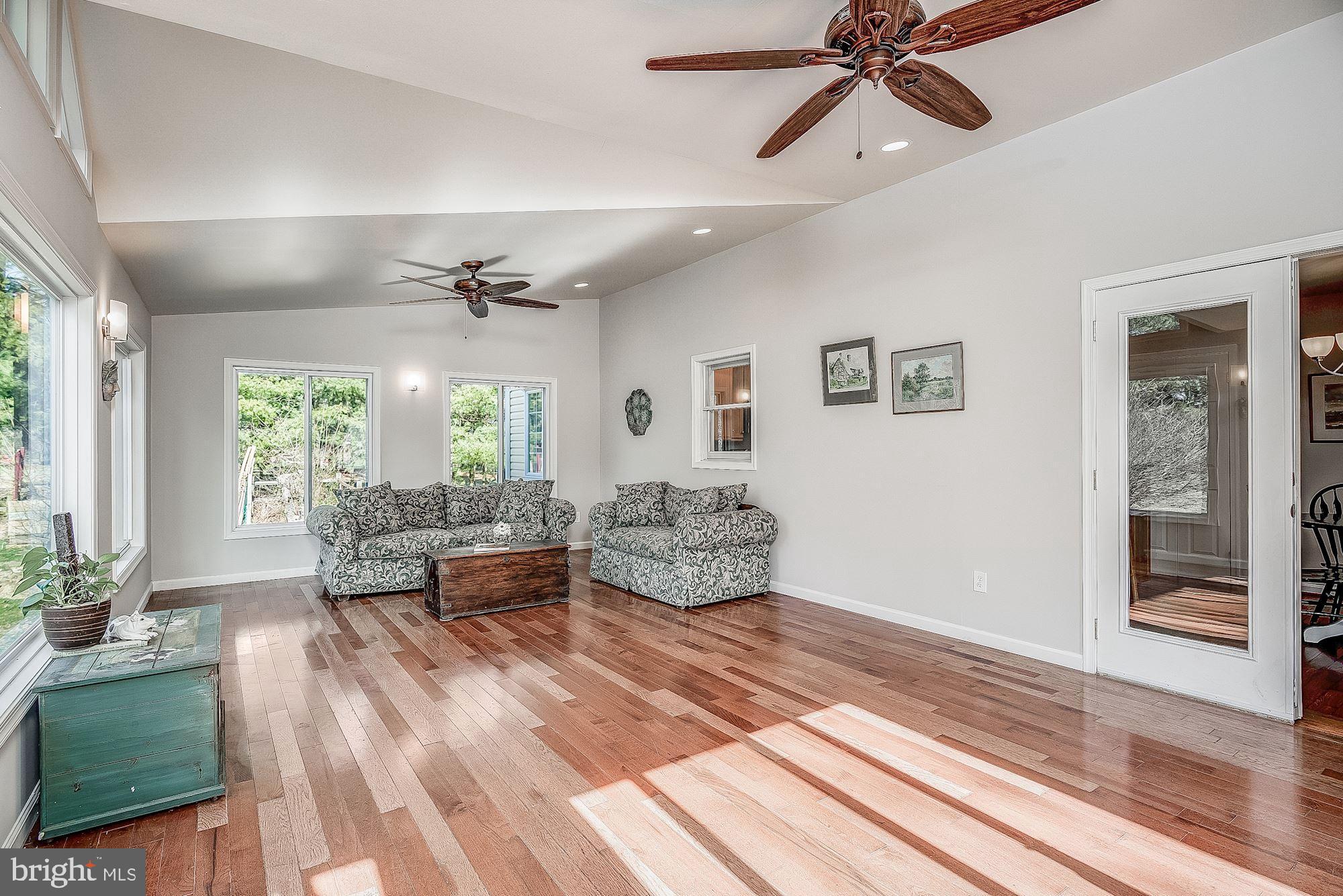 11912 Hall Shop Road Clarksville, MD 21029 - Photo 19 of 50 Sunroom Open to Kitchen and Rear Patio