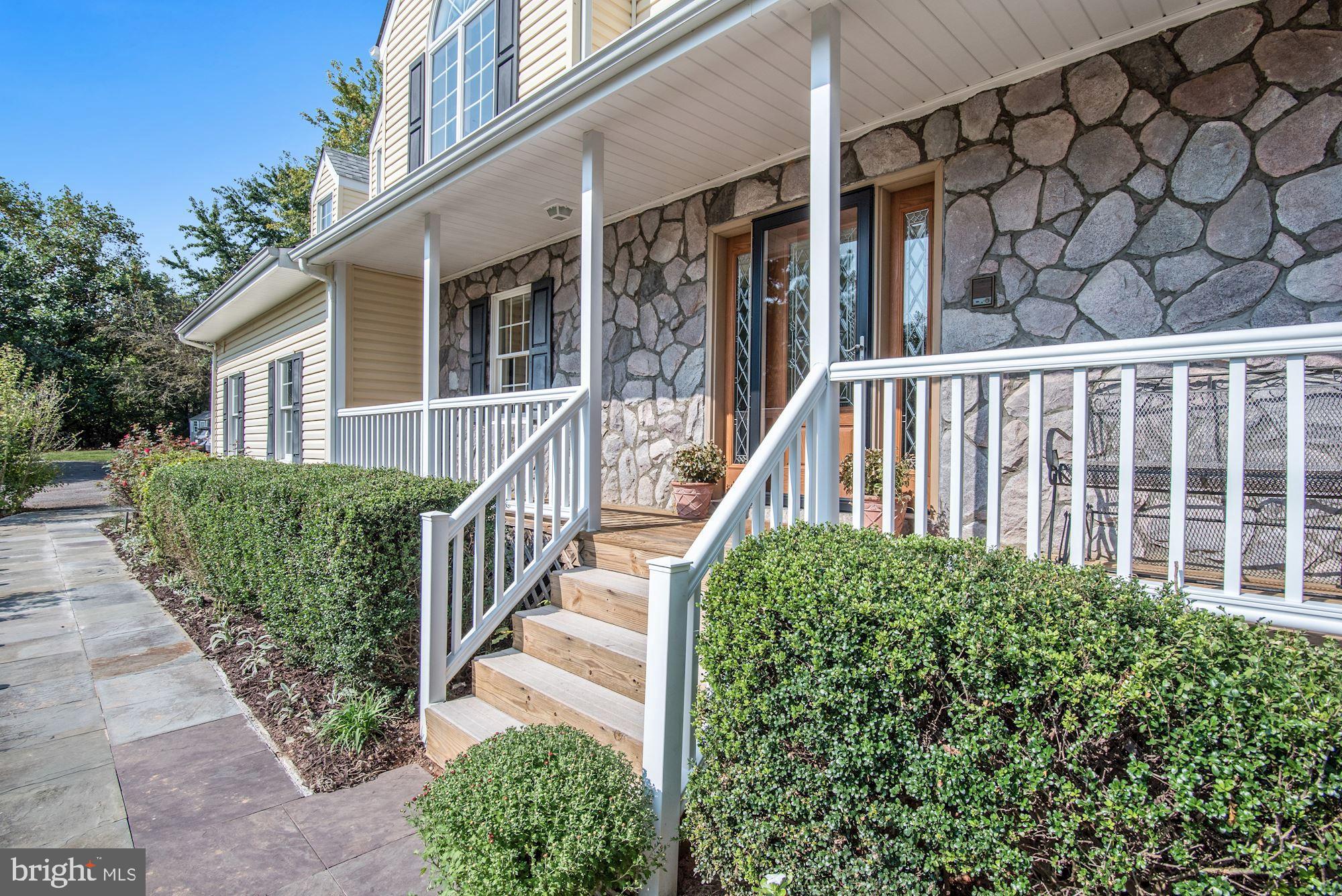 Welcoming Front Porch and Entrance