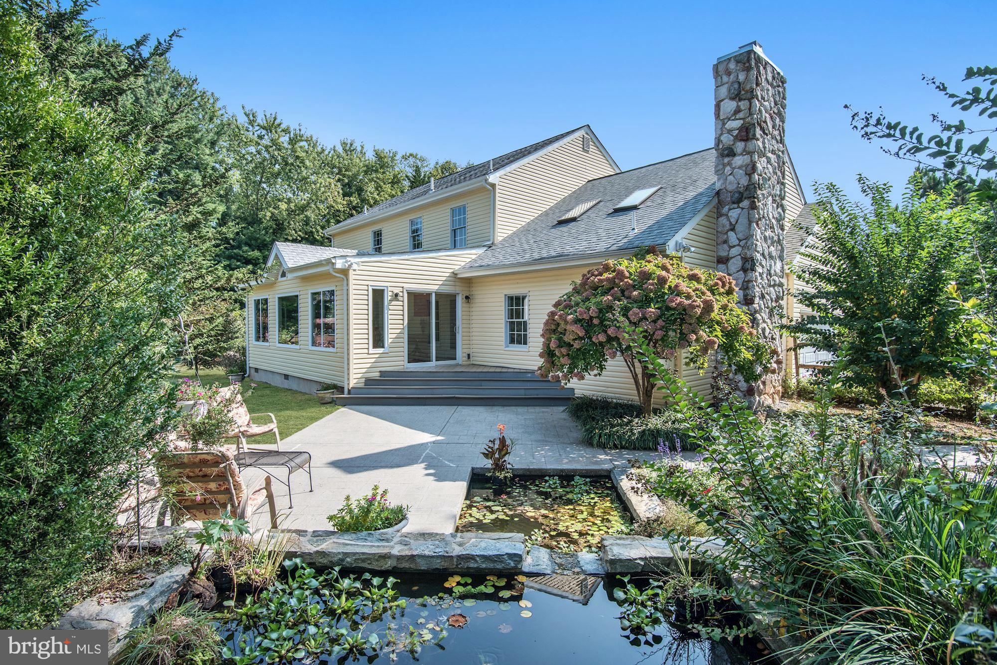 11912 Hall Shop Road Clarksville, MD 21029 - Photo 43 of 50 Rear Patio, Fountain and Lily Pond