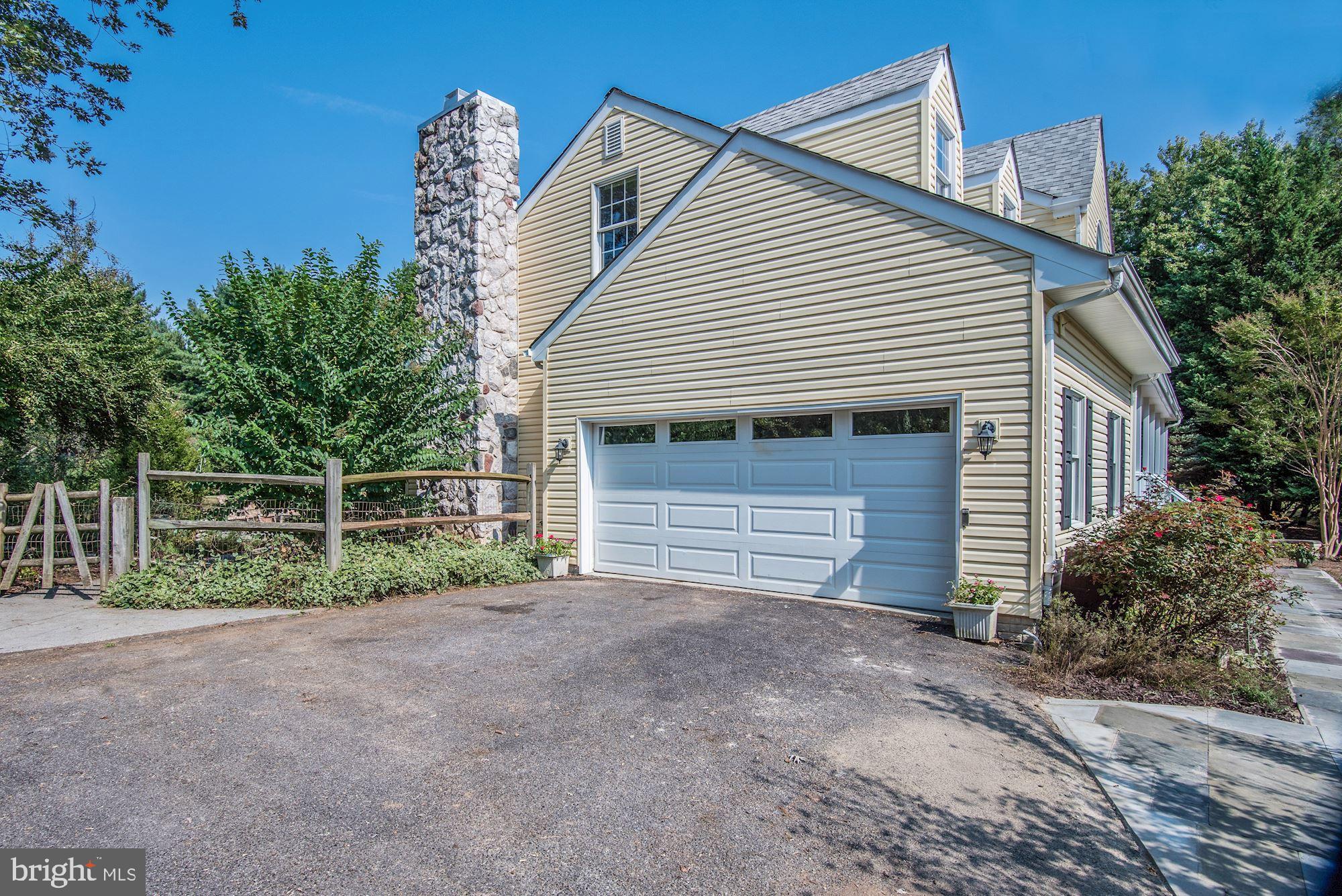 11912 Hall Shop Road Clarksville, MD 21029 - Photo 46 of 50 Side Exterior and Attached 2-Car Garage