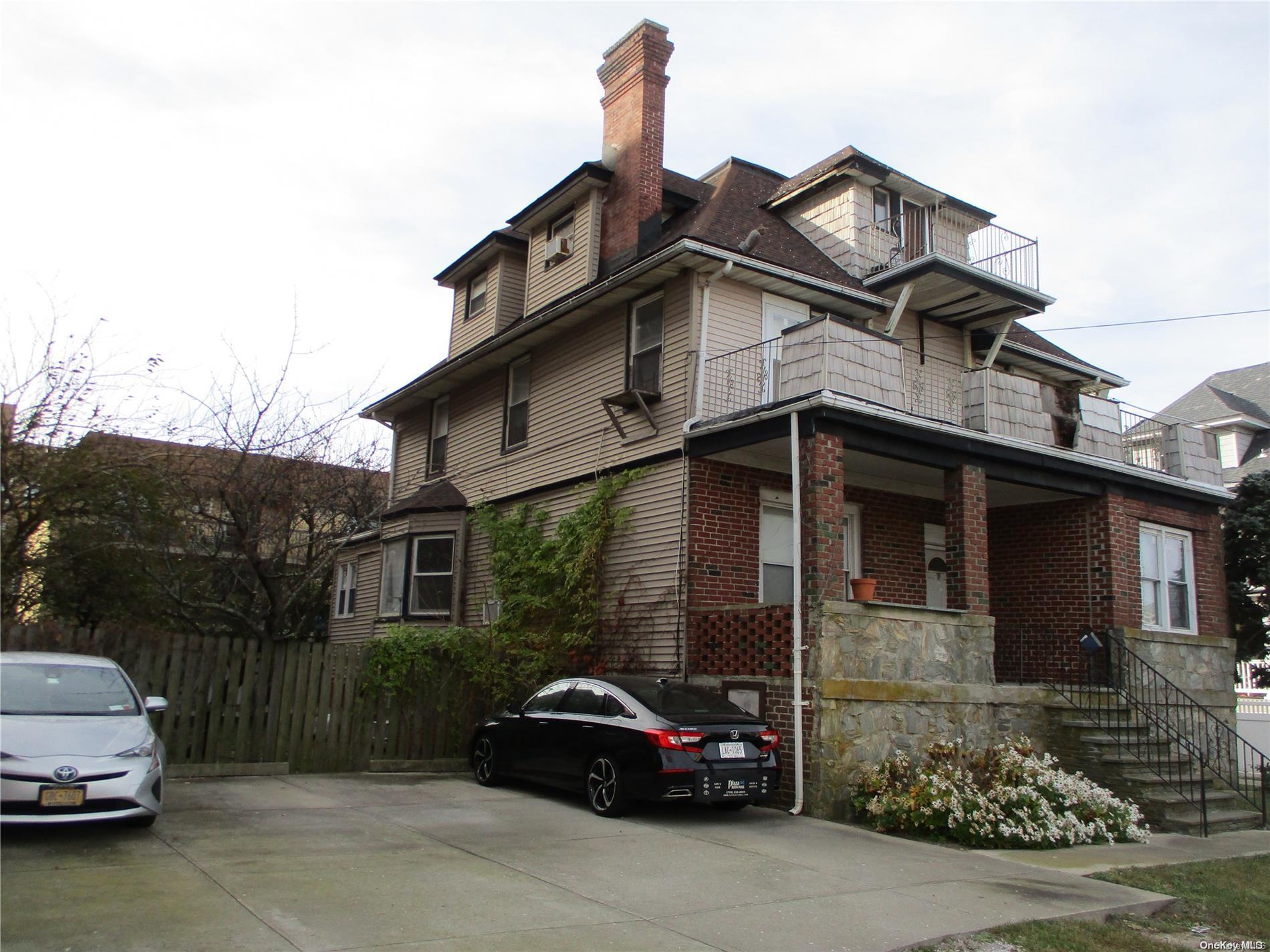 a car parked in front of a house