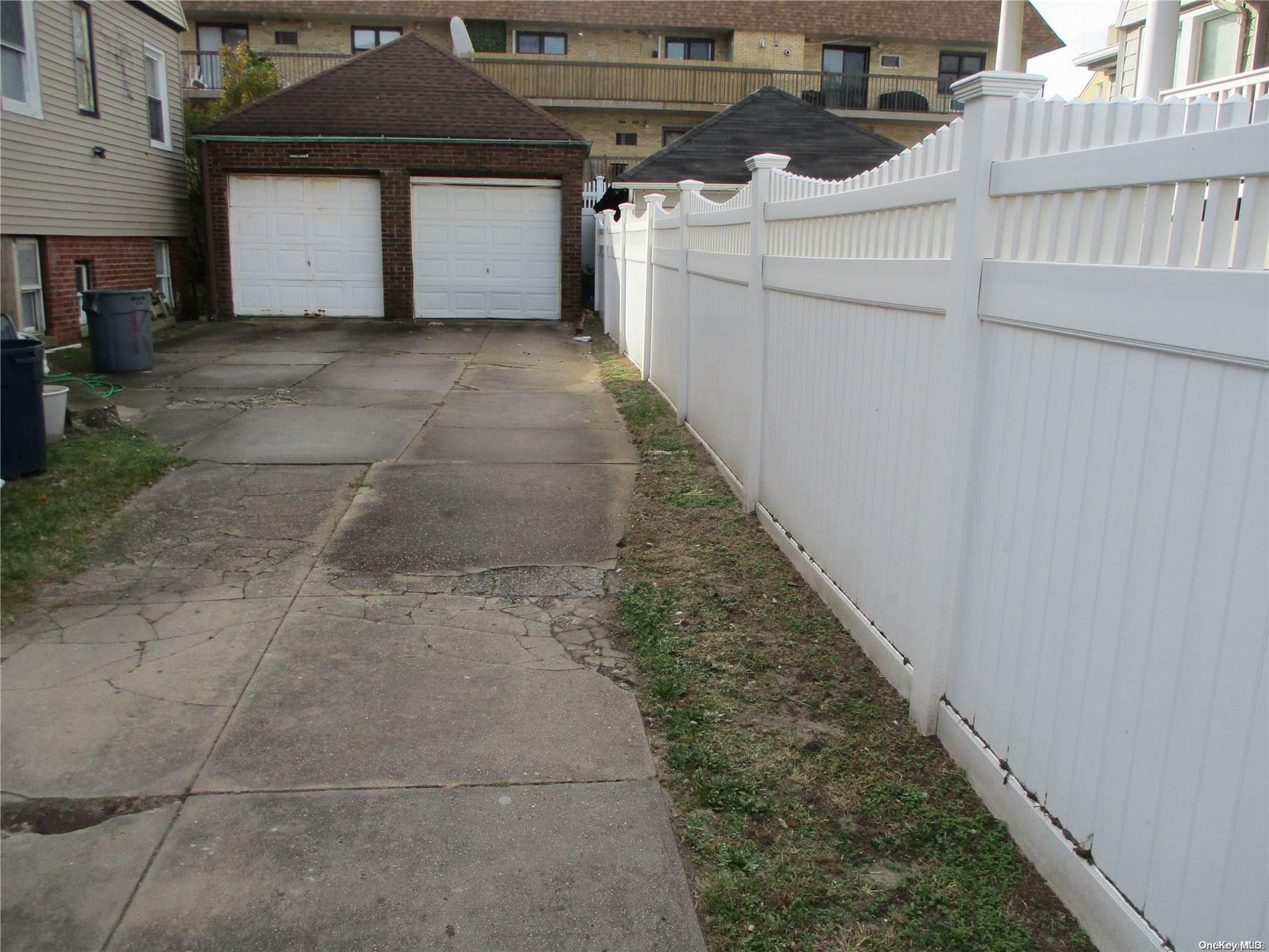 135 Beach 124th Street Queens, NY 11694 - Photo 12 of 25 a view of a garage