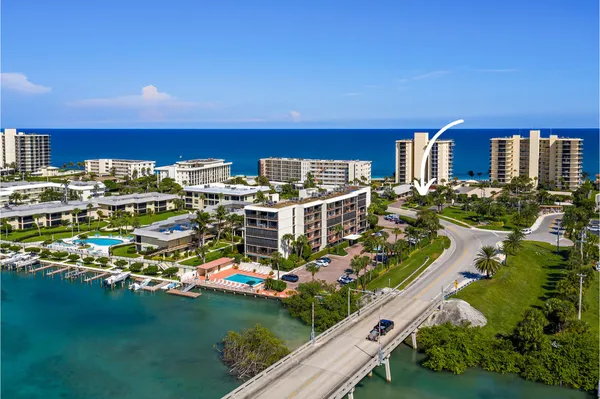 a view of a chairs and table in a patio