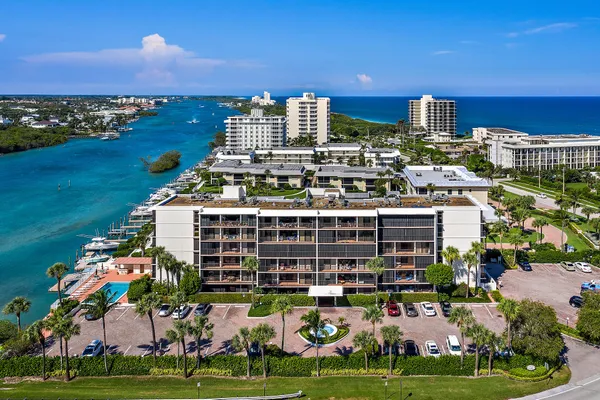 a view of a city with an ocean view