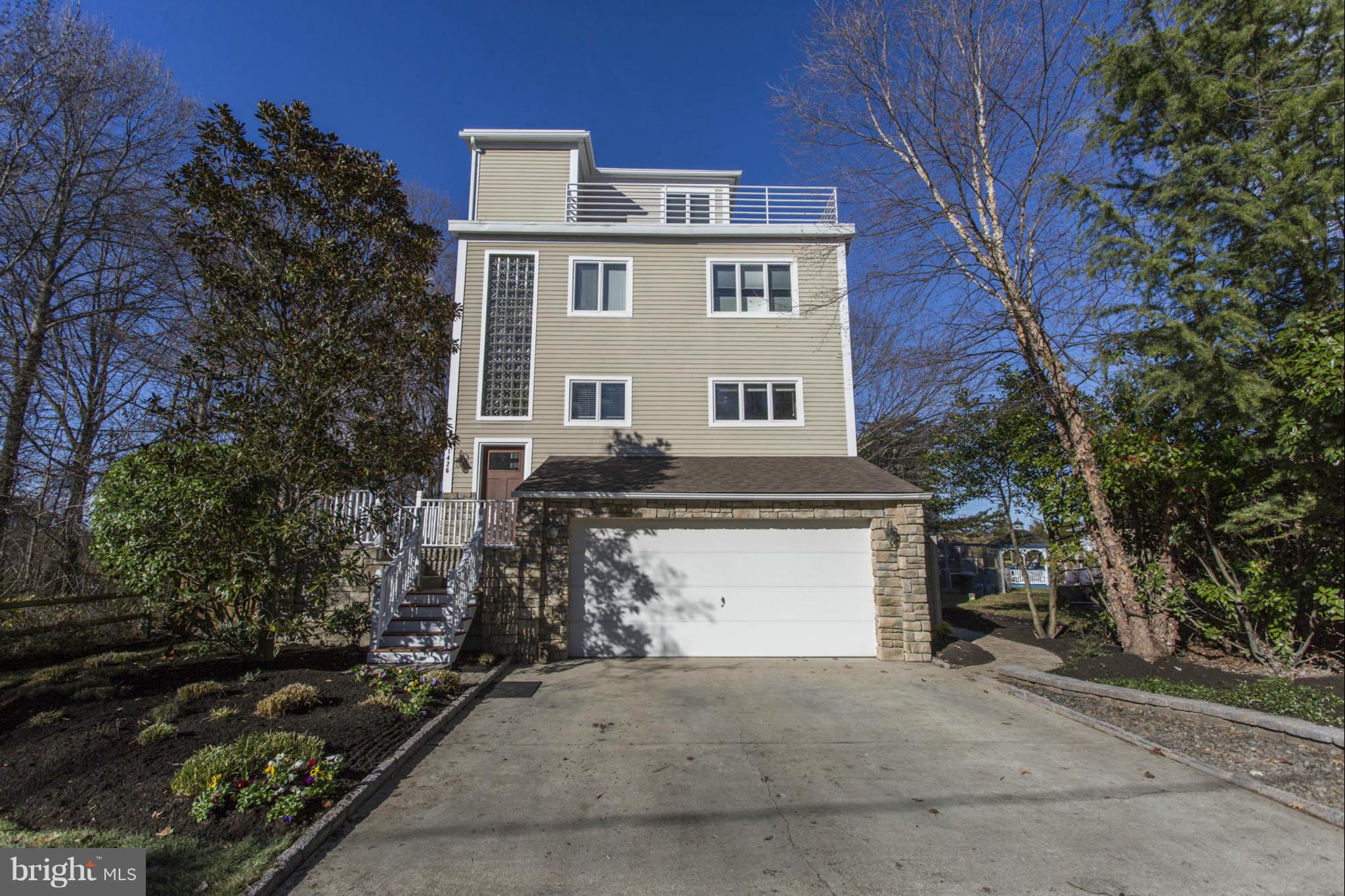 1426 Howard Road Annapolis, MD 21403 - Photo 1 of 30 a front view of a house with a yard