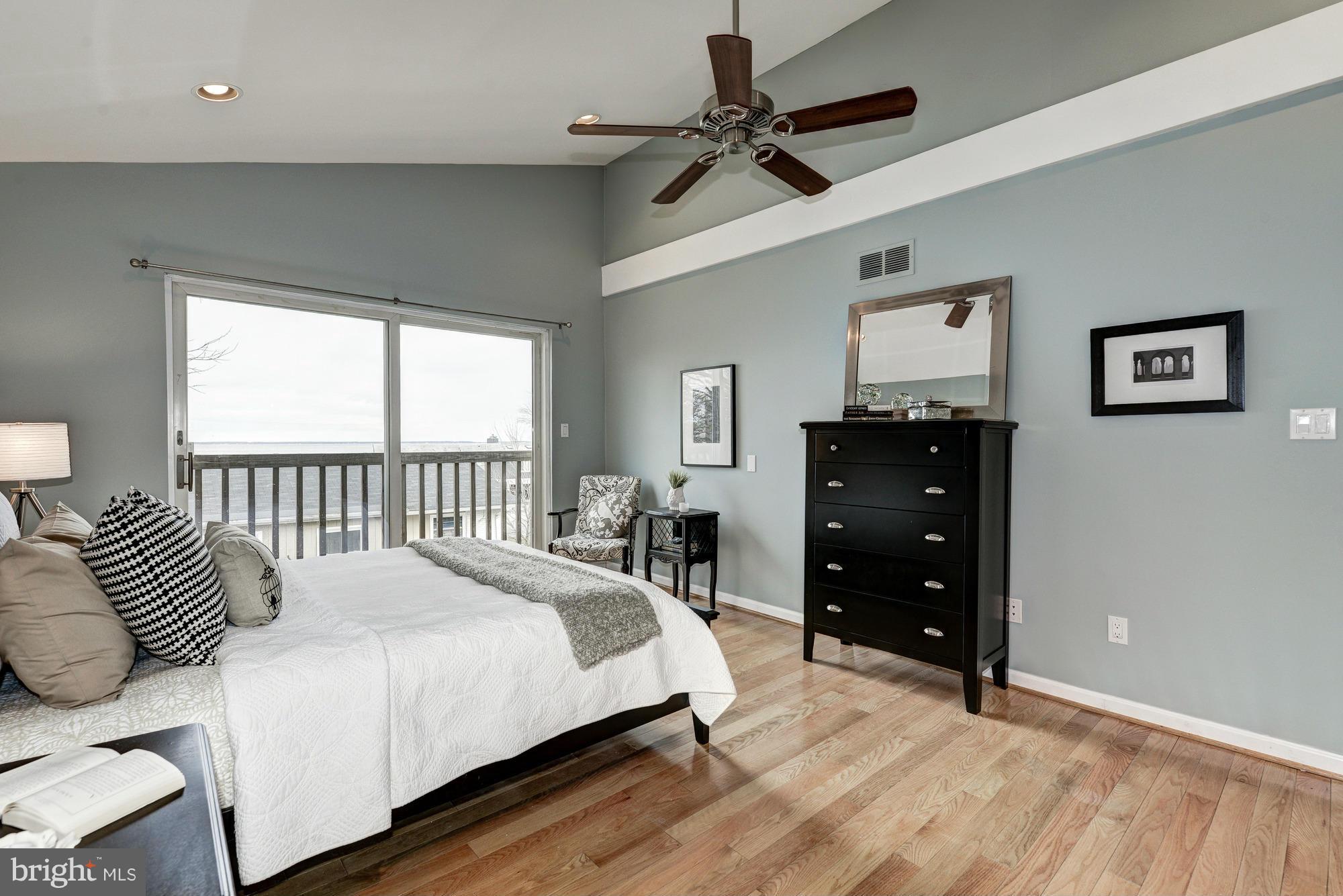 1426 Howard Road Annapolis, MD 21403 - Photo 15 of 30 a bedroom with a bed and a window