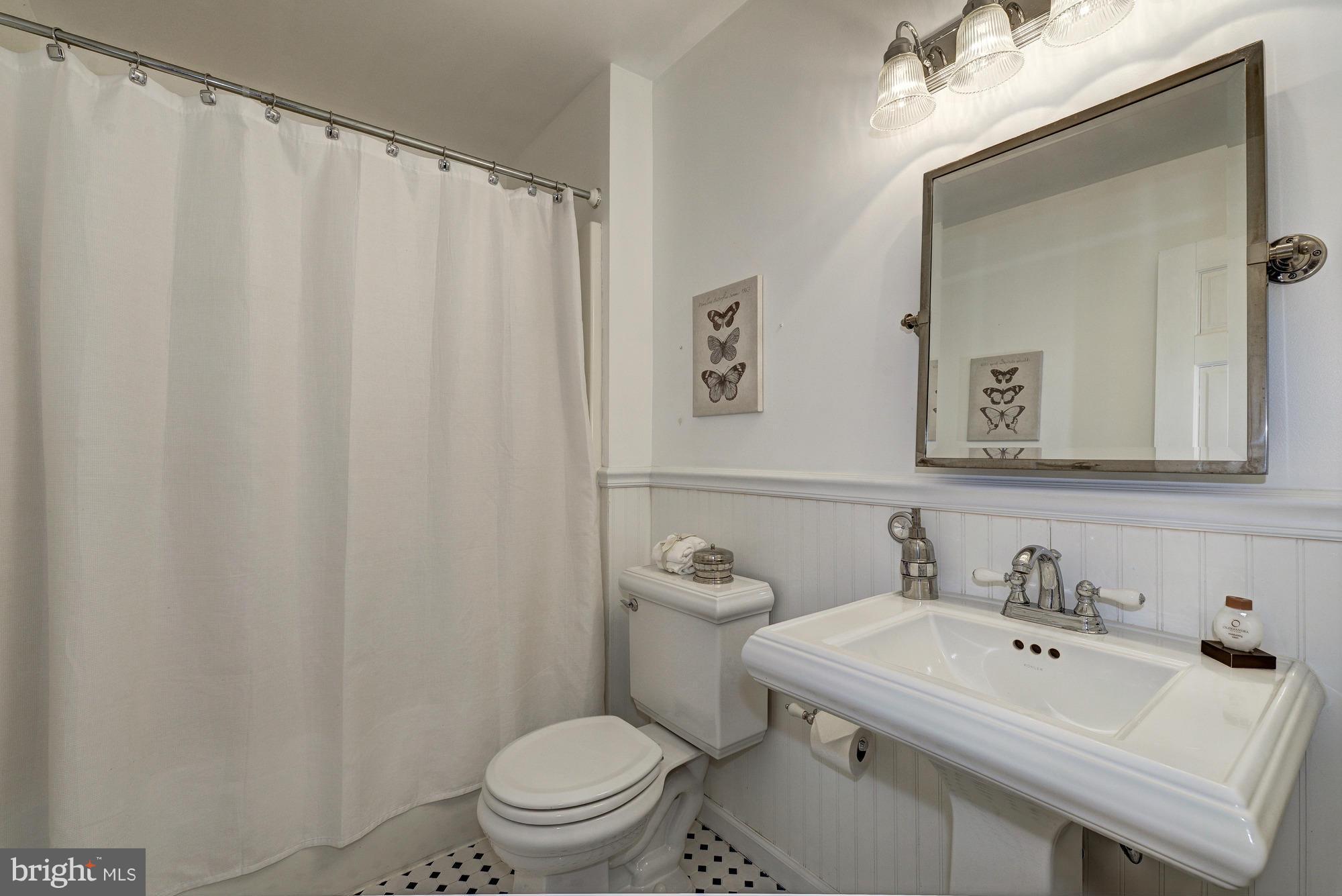1426 Howard Road Annapolis, MD 21403 - Photo 20 of 30 a bathroom with a sink and a toilet