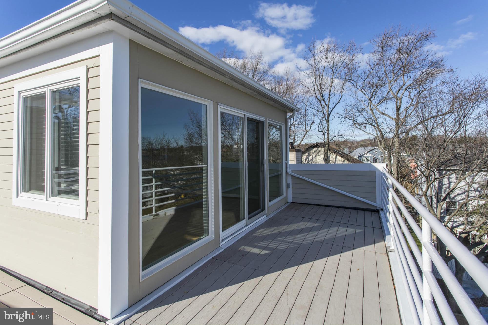 1426 Howard Road Annapolis, MD 21403 - Photo 22 of 30 a view of a house with a large window and wooden floor