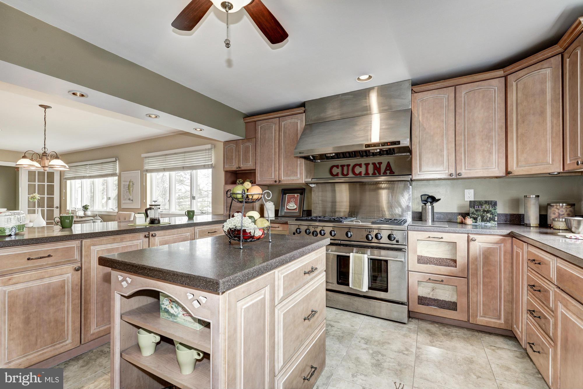 1426 Howard Road Annapolis, MD 21403 - Photo 6 of 30 a kitchen with a stove cabinets and window