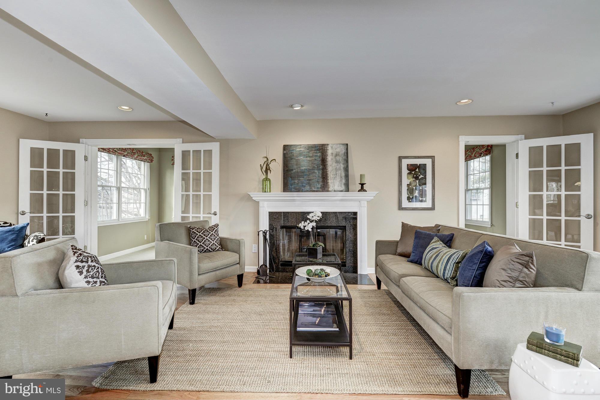 1426 Howard Road Annapolis, MD 21403 - Photo 9 of 30 a living room with furniture and a fireplace
