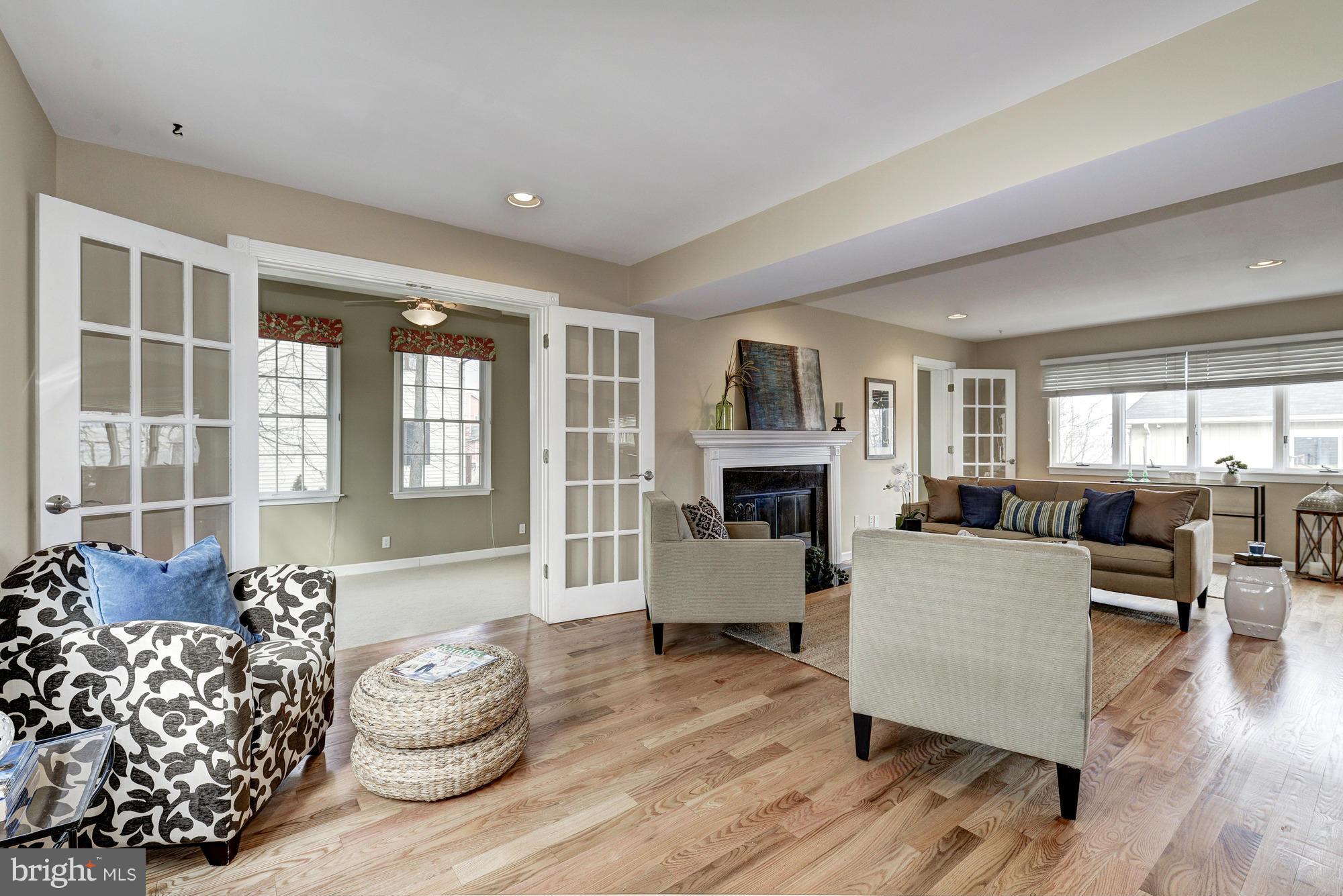 1426 Howard Road Annapolis, MD 21403 - Photo 10 of 30 a living room with furniture and a fireplace