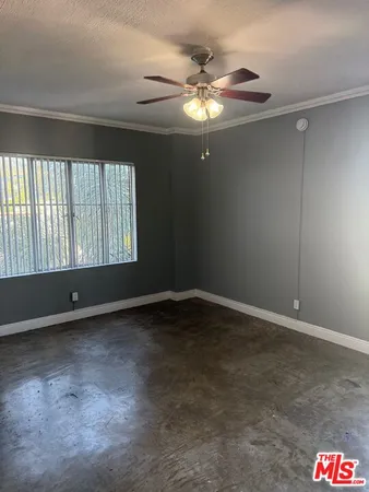 a kitchen with a stove and a refrigerator