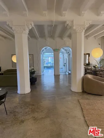 a view of a hallway with a couch