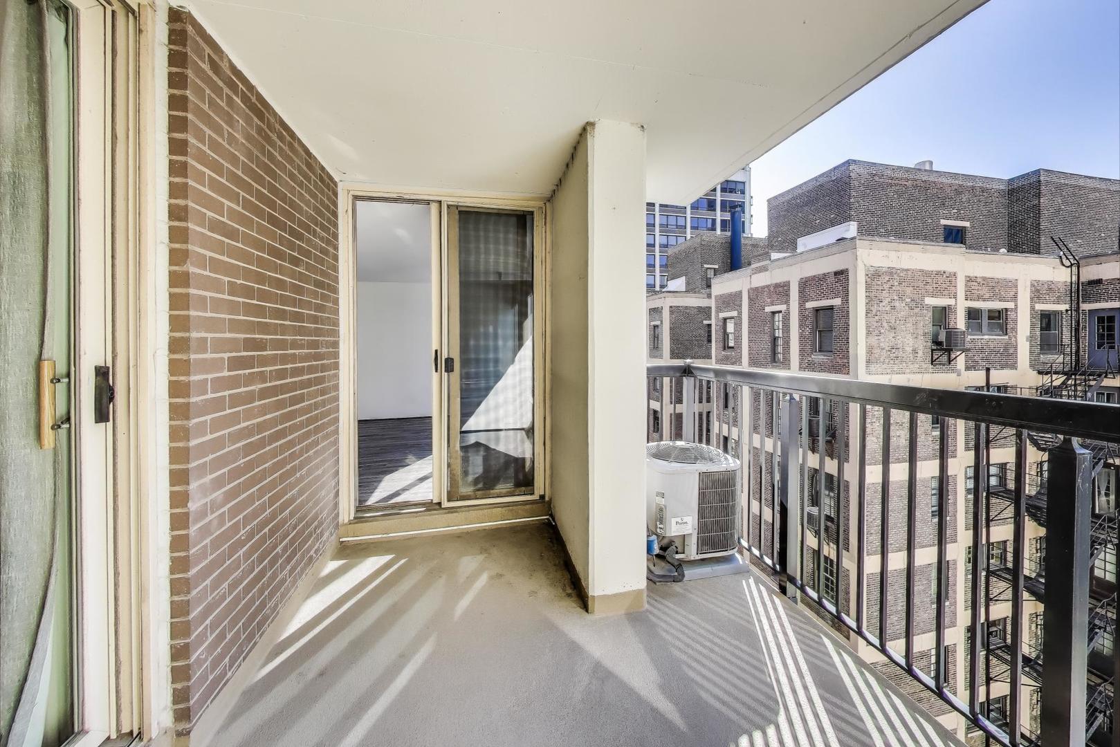 201 East Chestnut Street, Unit 19F Chicago, IL 60611 - Photo 17 of 36 a view of a building from a balcony