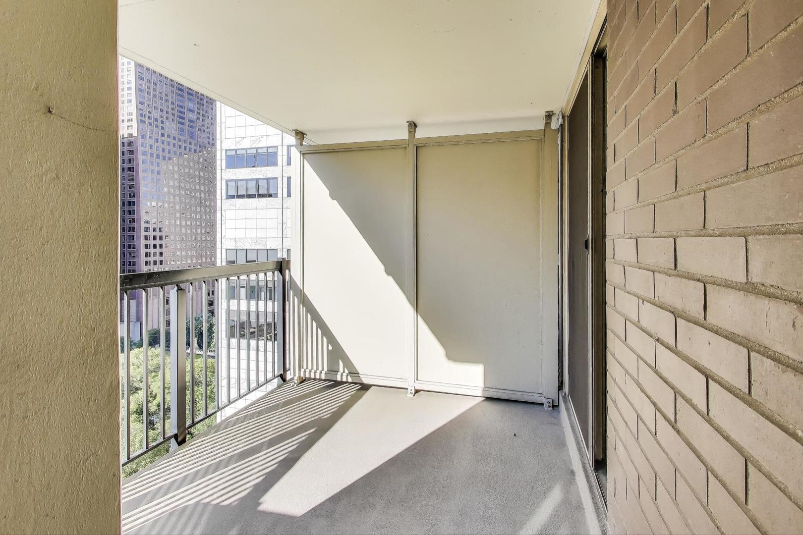 201 East Chestnut Street, Unit 19F Chicago, IL 60611 - Photo 18 of 36 a view of a balcony with staircase