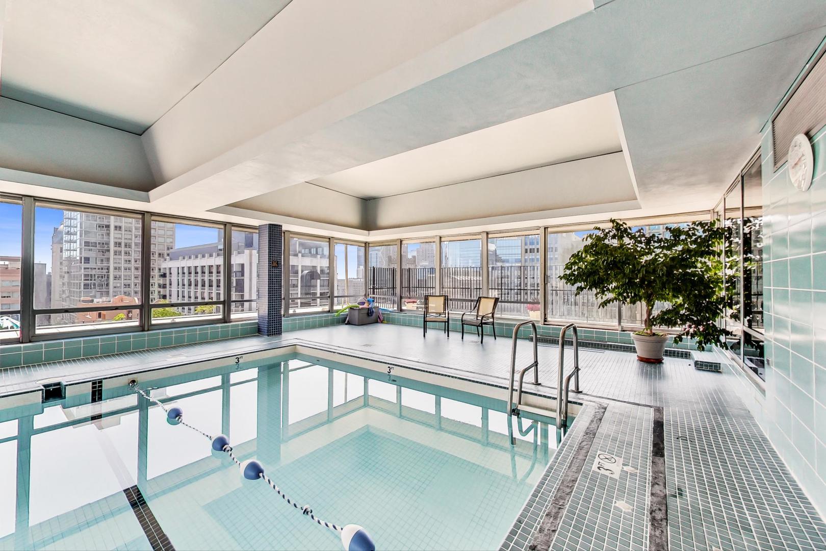 201 East Chestnut Street, Unit 19F Chicago, IL 60611 - Photo 26 of 36 a indoor swimming pool with outdoor seating