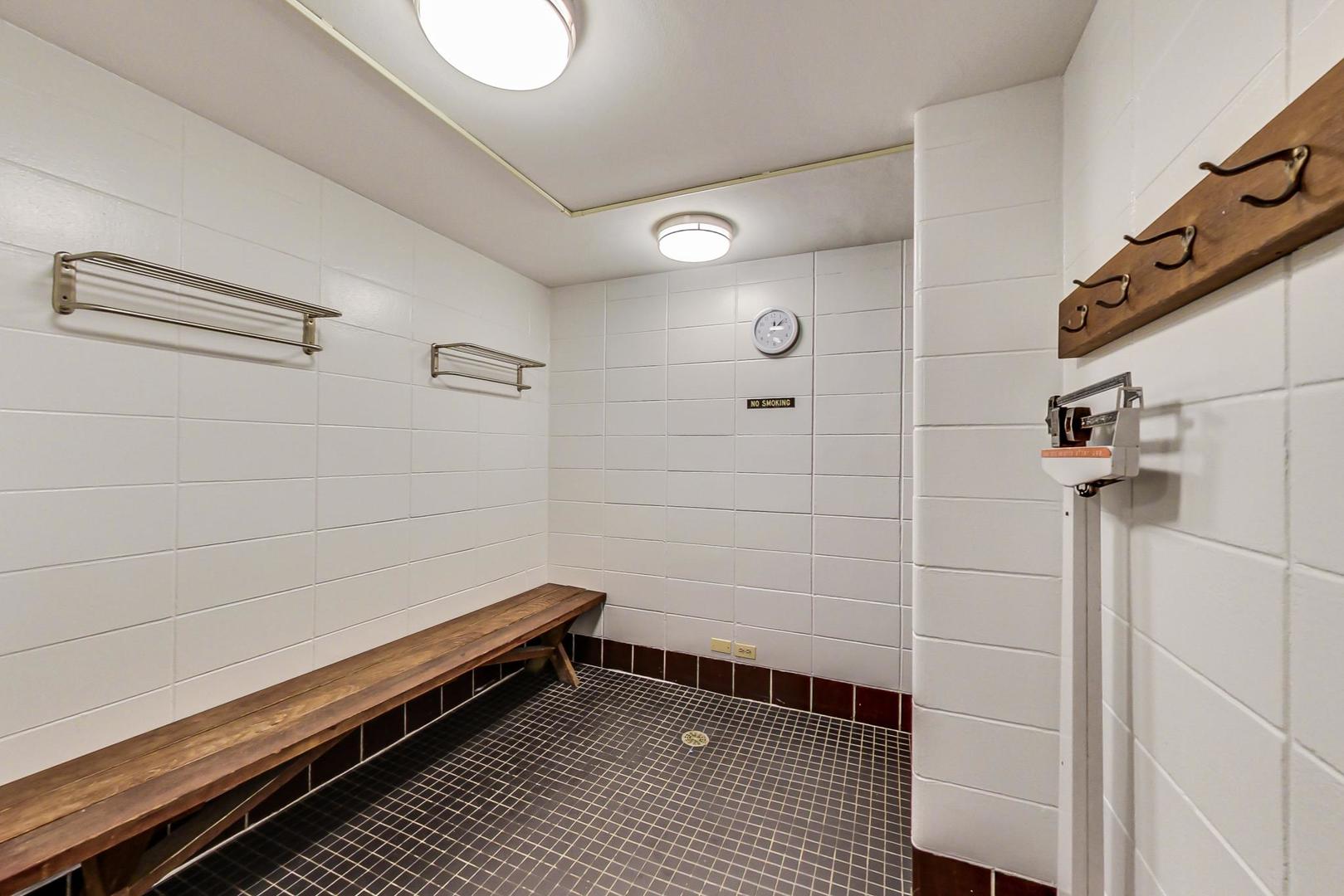 201 East Chestnut Street, Unit 19F Chicago, IL 60611 - Photo 35 of 36 a bathroom with a shower