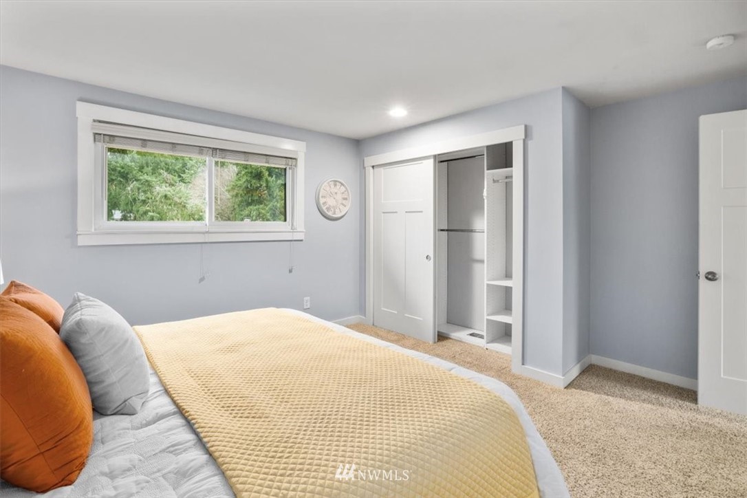 2630 171st Street Southeast Bothell, WA 98012 - Photo 20 of 36 a bedroom with a bed and a window
