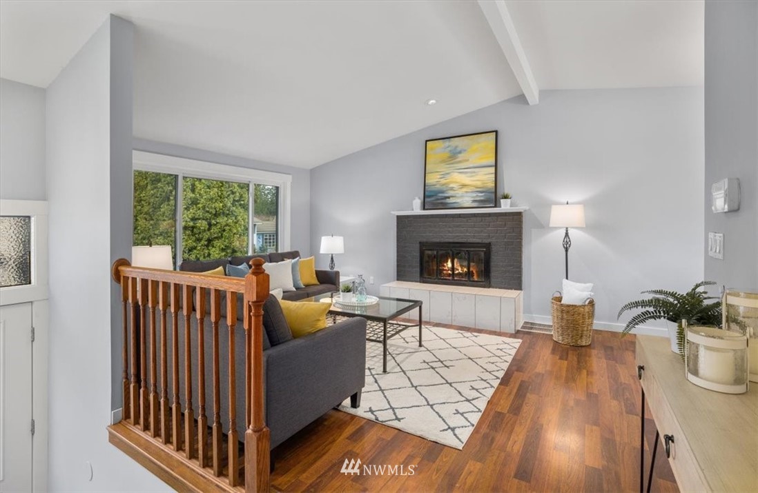 2630 171st Street Southeast Bothell, WA 98012 - Photo 3 of 36 a living room with furniture fireplace and window