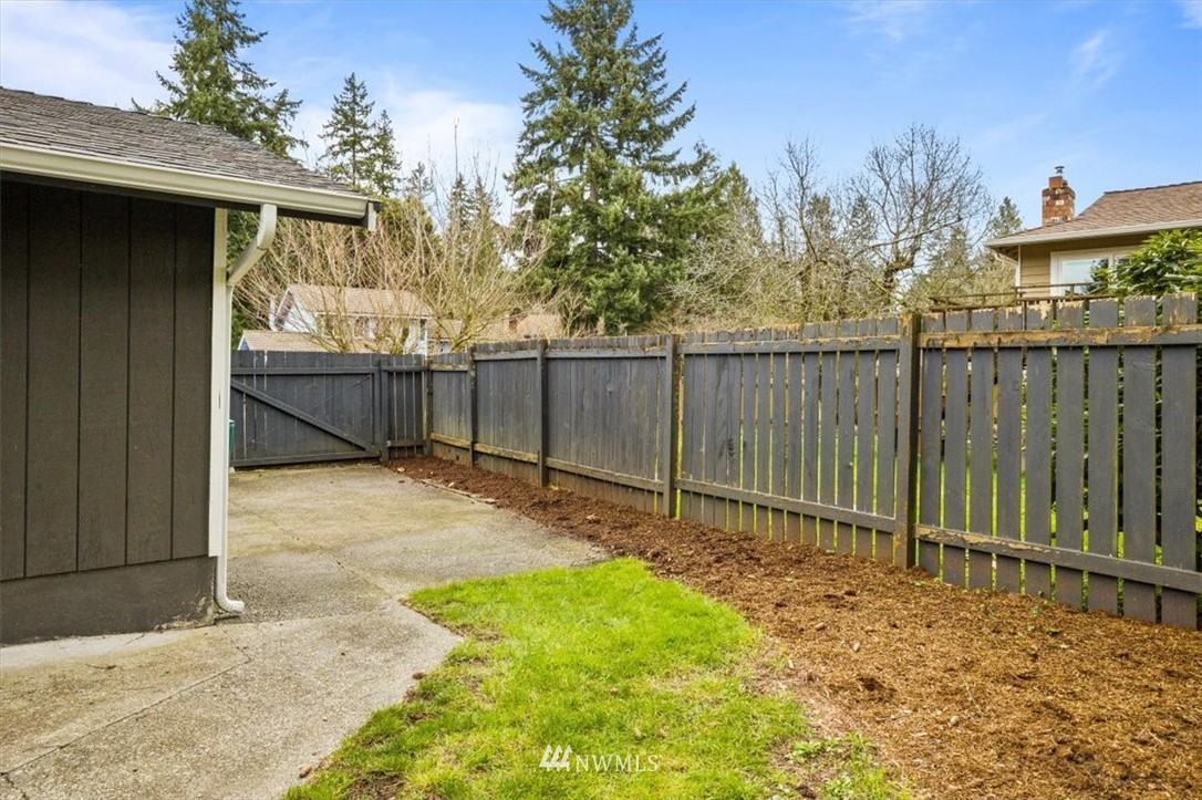 2630 171st Street Southeast Bothell, WA 98012 - Photo 35 of 36 a backyard of a house with a tree