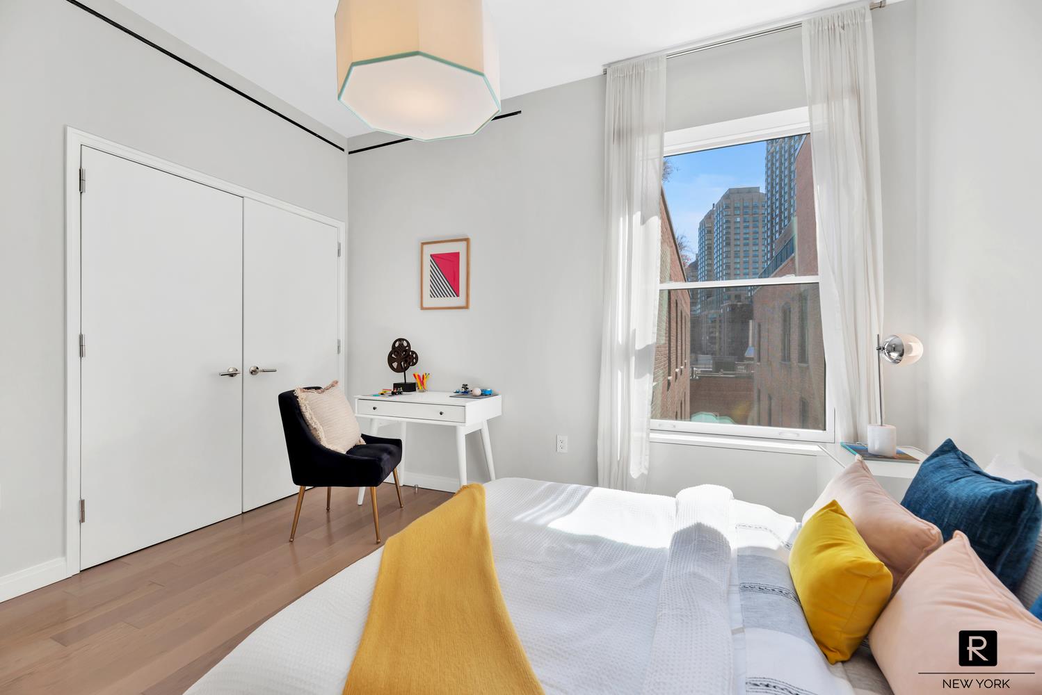 350 West 71st Street, Unit PHA Manhattan, NY 10023 - Photo 11 of 25 a living room with furniture and a window