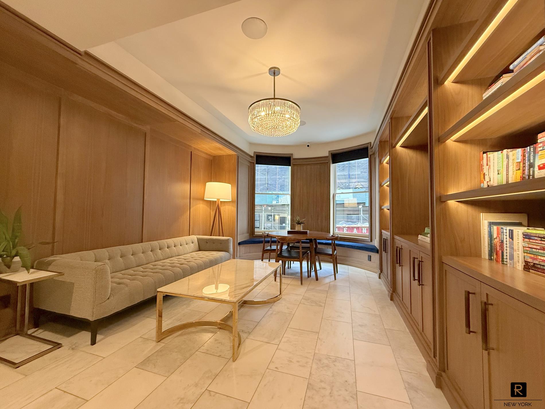 350 West 71st Street, Unit PHA Manhattan, NY 10023 - Photo 20 of 25 a living room with furniture a window and a table