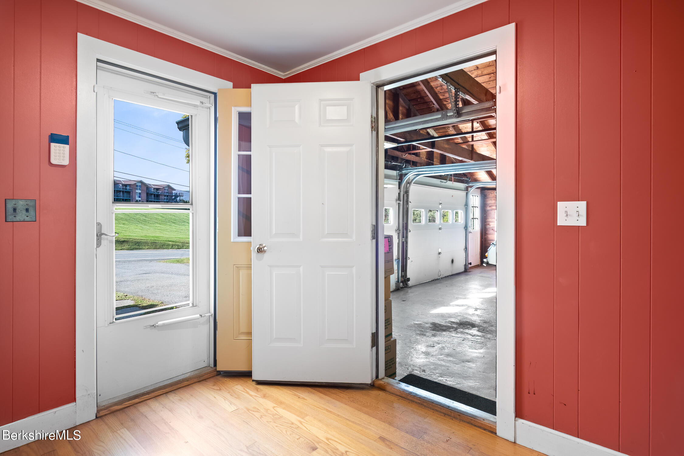 186 Stratton Road Williamstown, MA 01267 - Photo 17 of 33 a view of a hallway with wooden floor and windows