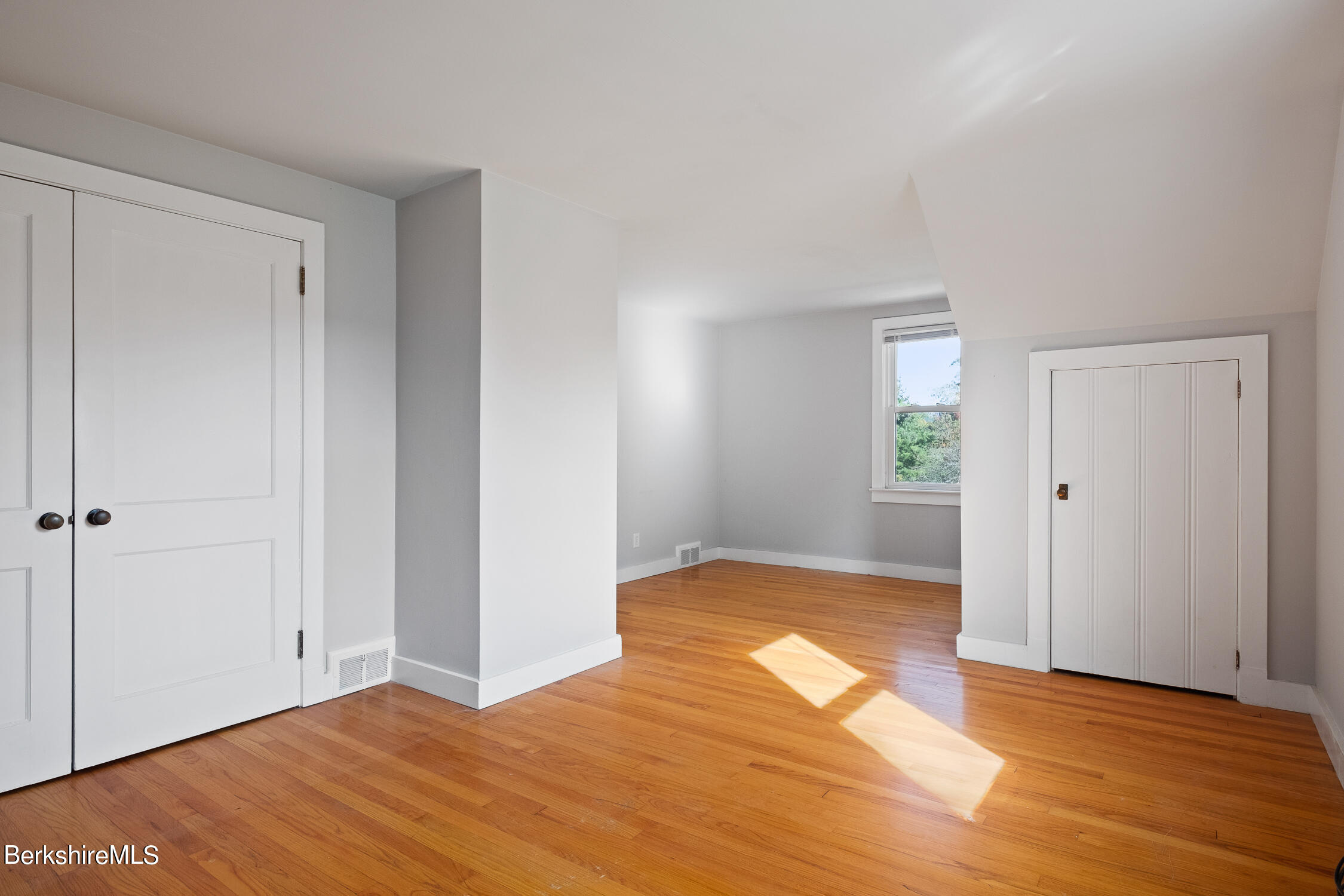 186 Stratton Road Williamstown, MA 01267 - Photo 26 of 33 a view of empty room with wooden floor