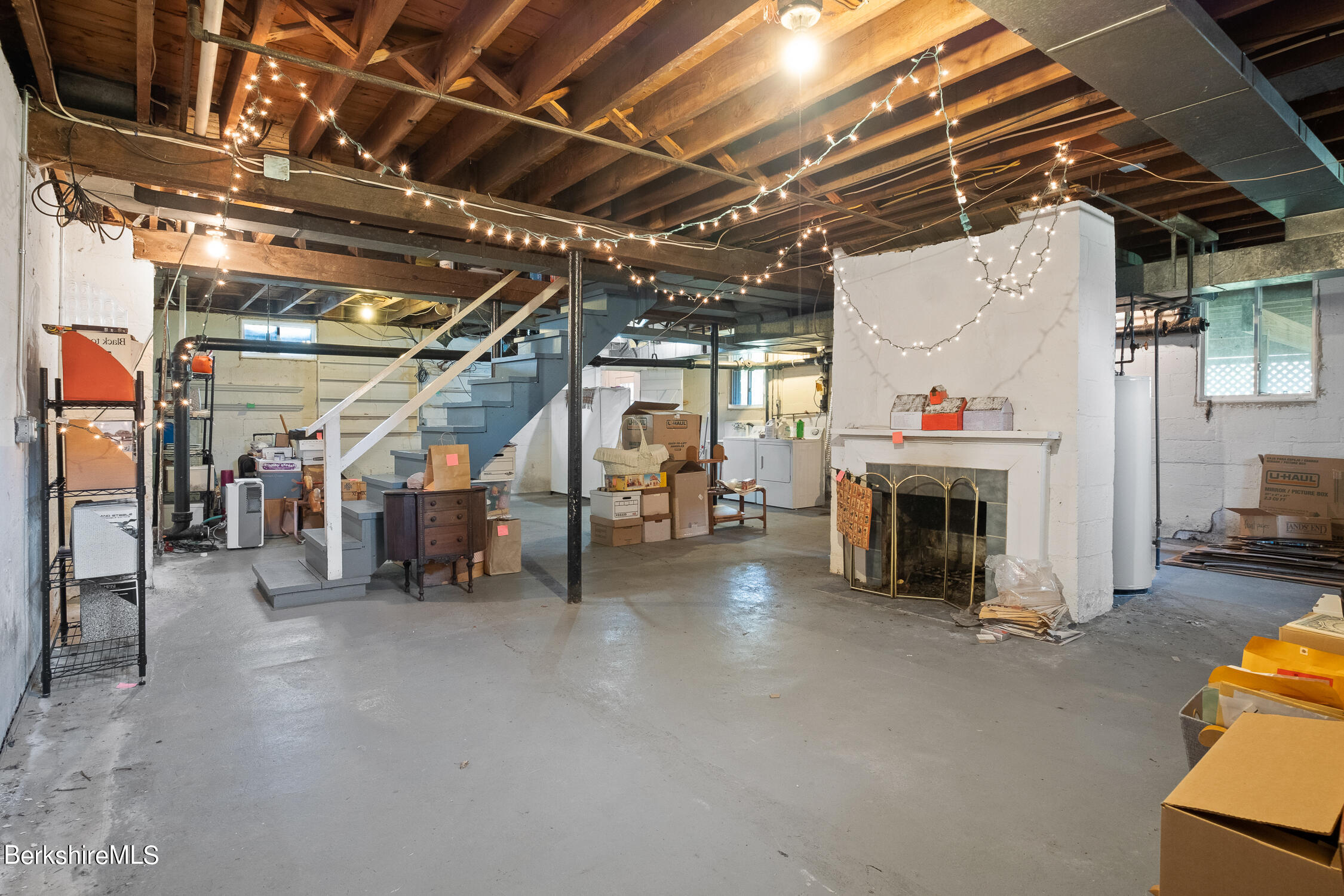 186 Stratton Road Williamstown, MA 01267 - Photo 27 of 33 a view of a garage with a fireplace