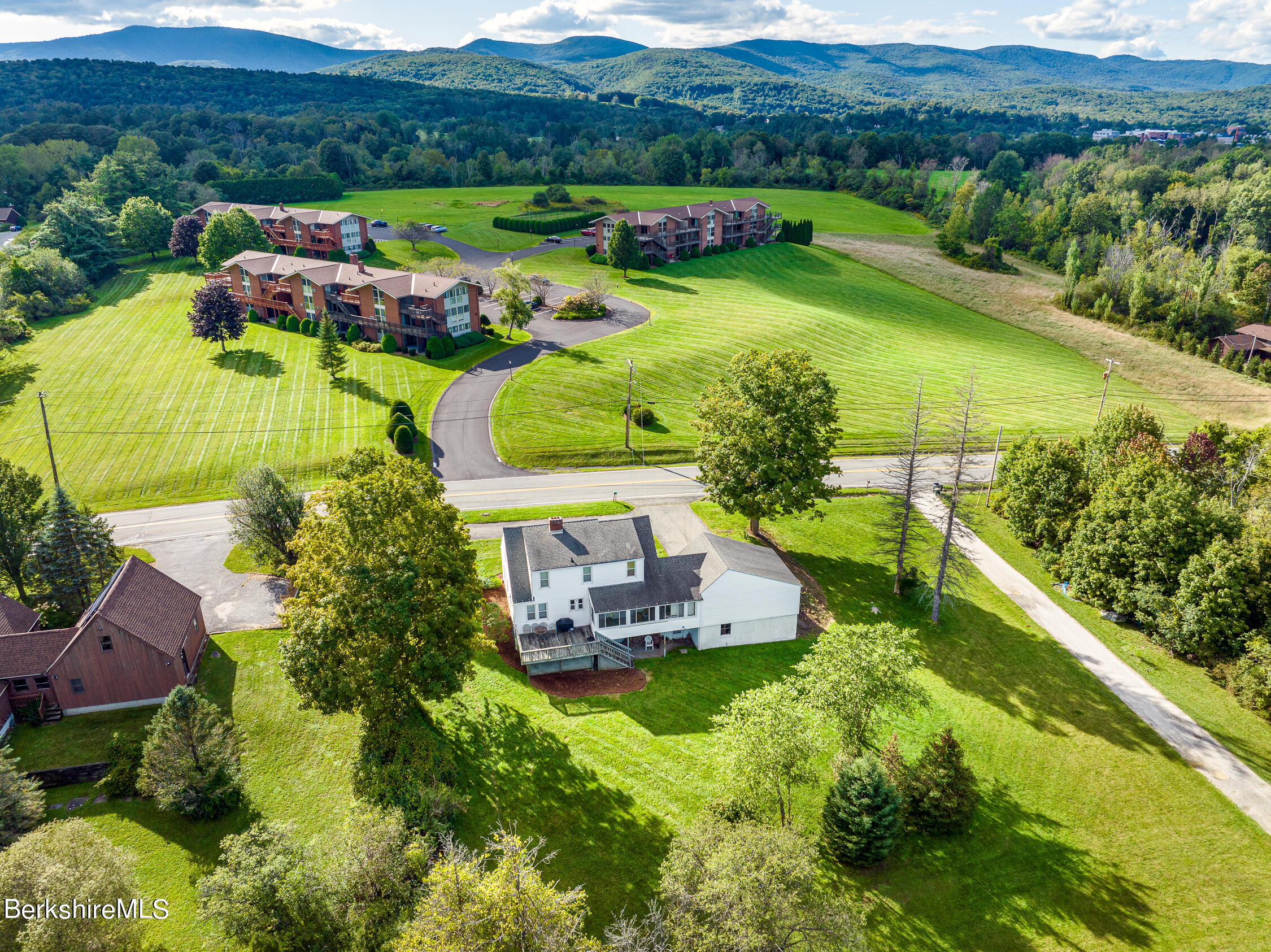 186 Stratton Road Williamstown, MA 01267 - Photo 32 of 33 an aerial view of a house with a garden and lake view
