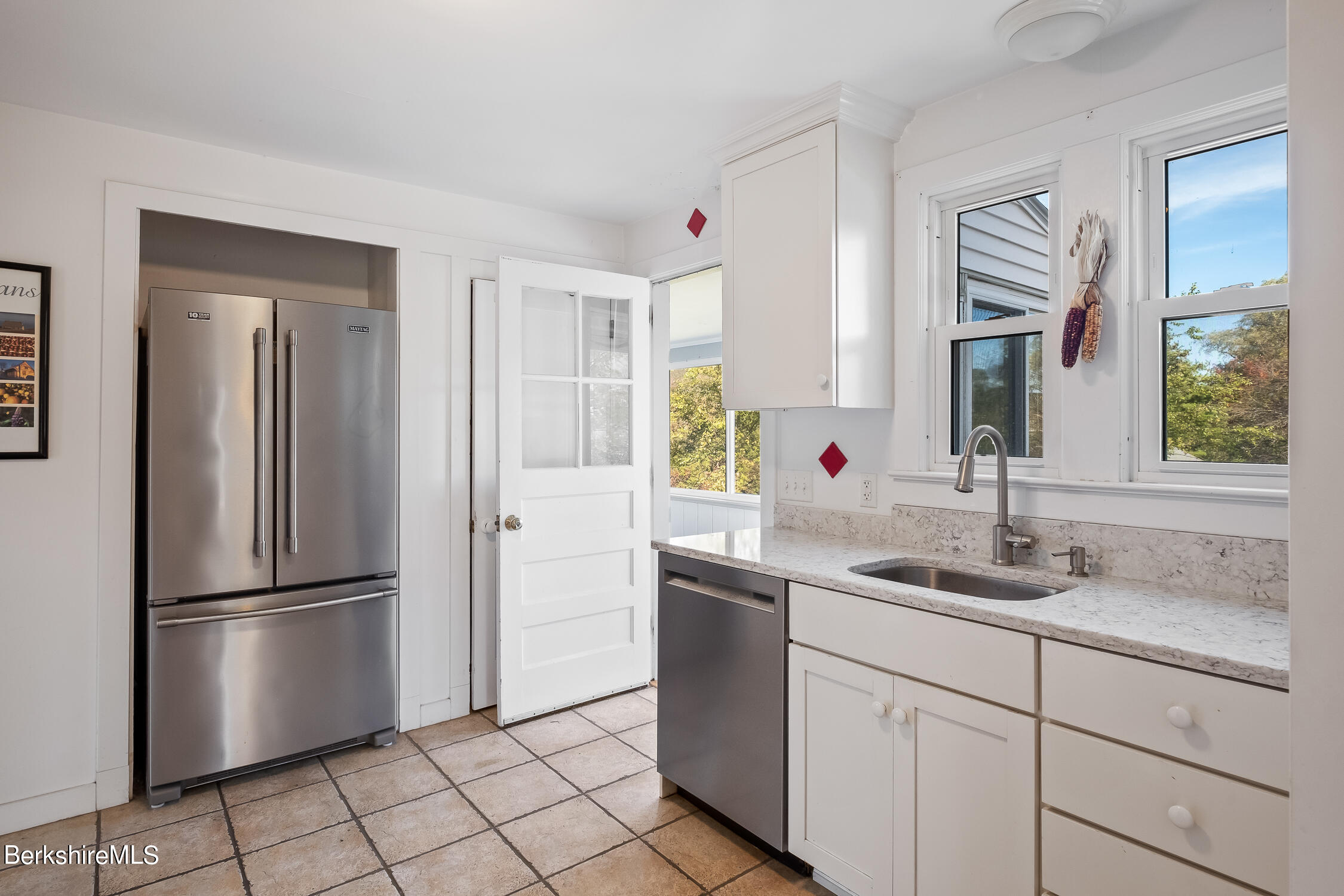186 Stratton Road Williamstown, MA 01267 - Photo 8 of 33 a kitchen with a refrigerator and a sink