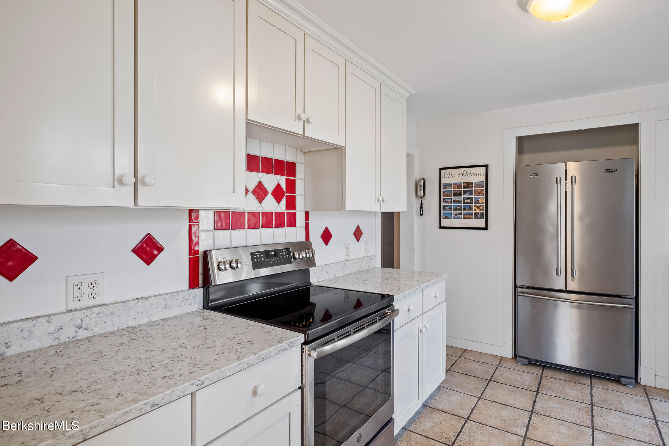 186 Stratton Road Williamstown, MA 01267 - Photo 9 of 33 a kitchen with a white cabinets and white appliances