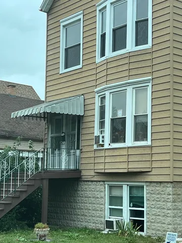a front view of a house with balcony