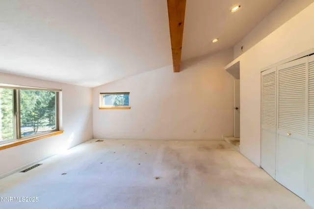 a bathroom with a shower and toilet