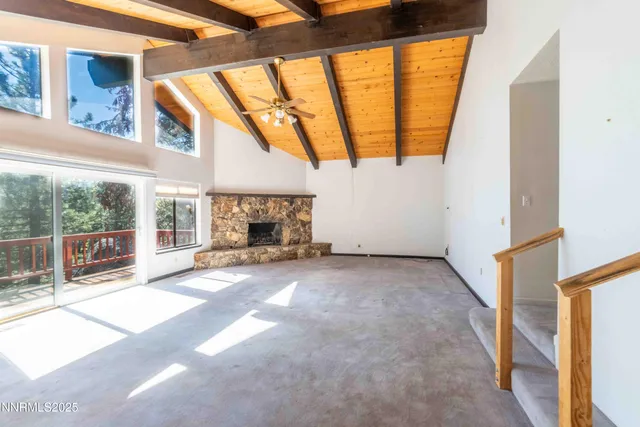 a view of livingroom with furniture and window