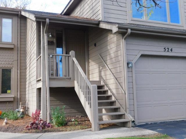 524 Triton Avenue Rockford, IL 61107 - Photo 2 of 18 a view of a house with entryway and wooden floor