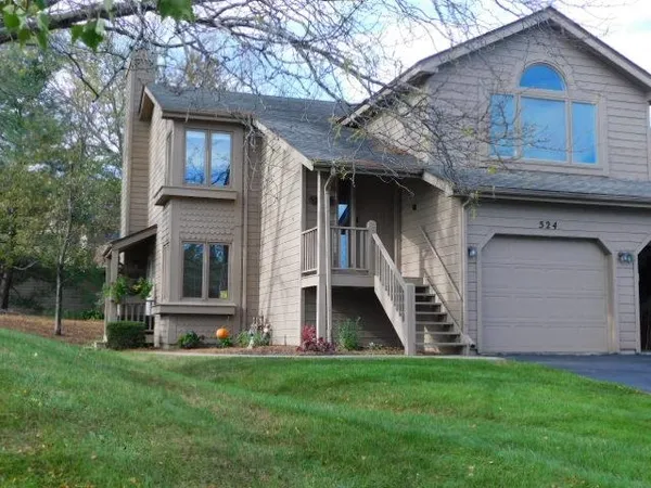 a front view of house with yard