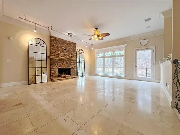 a view of a hallway with windows