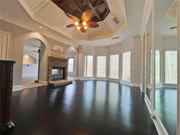 a living room with a couch and a large window