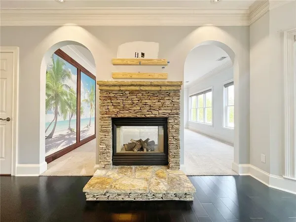 a bedroom with a bed dresser and a window