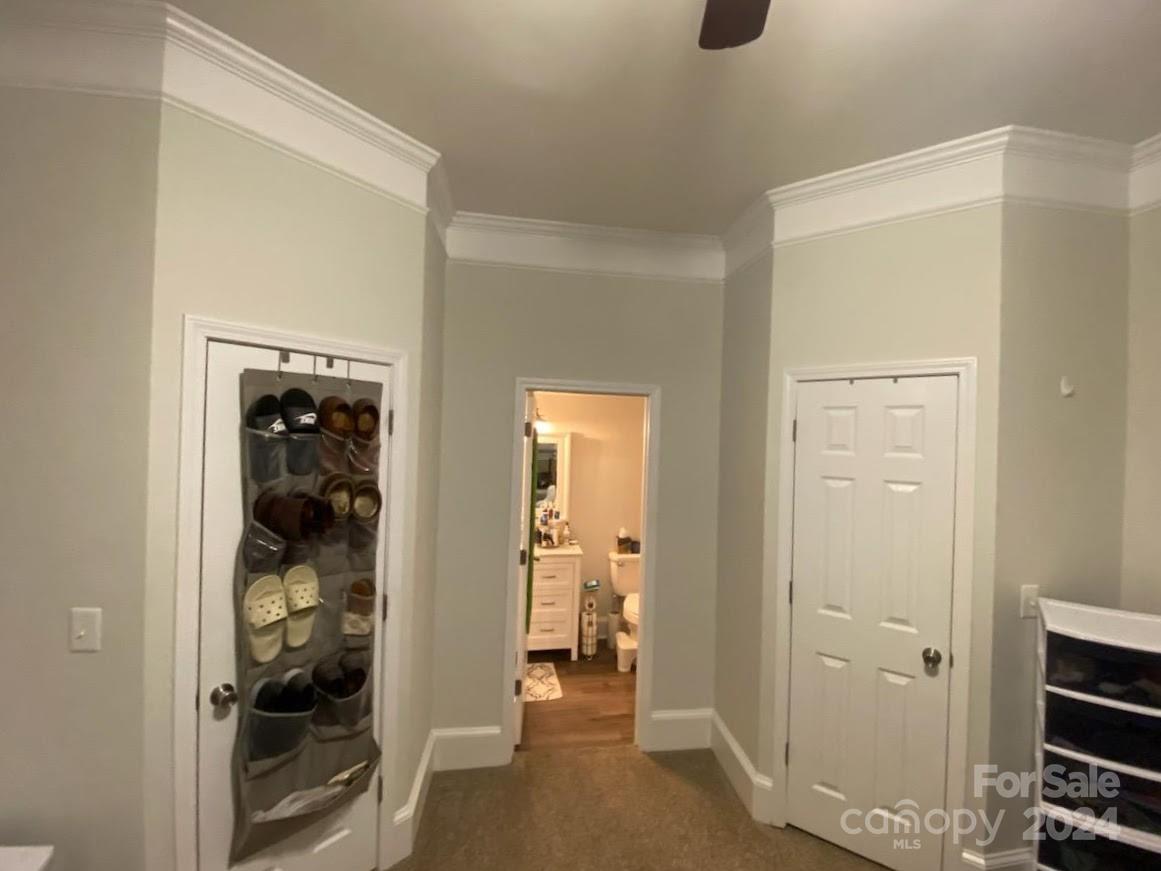 802 McLain Road Kannapolis, NC 28083 - Photo 12 of 20 a view of a hallway with wooden floor and closet