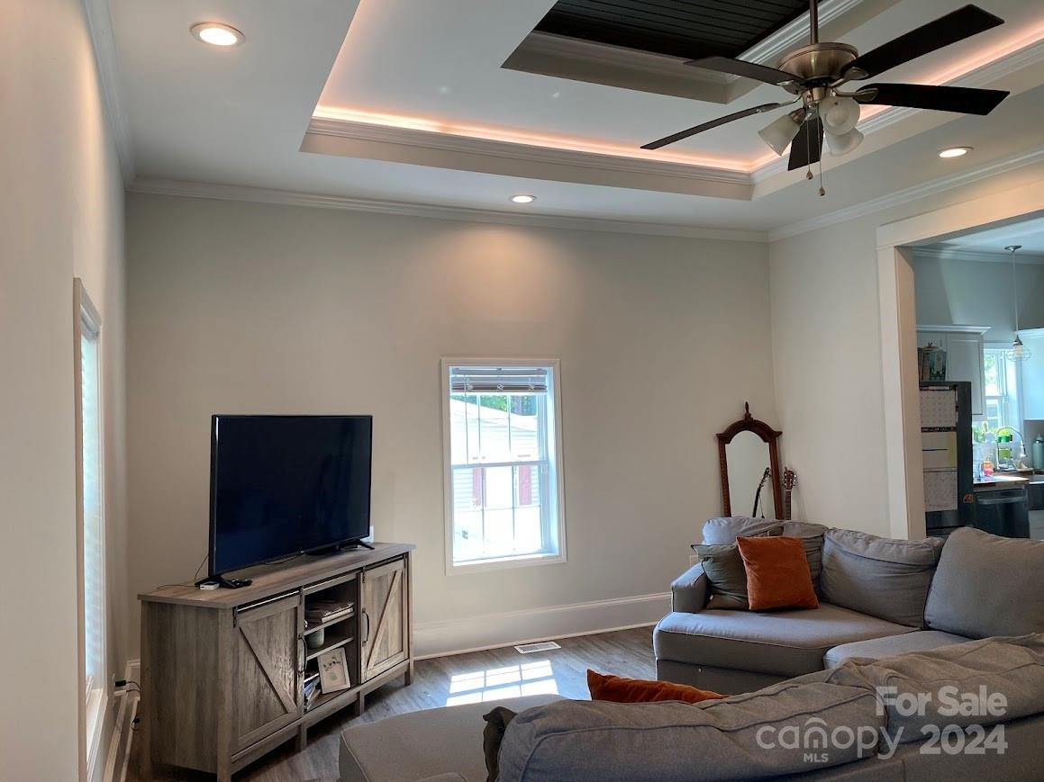 802 McLain Road Kannapolis, NC 28083 - Photo 6 of 20 a living room with furniture and a flat screen tv