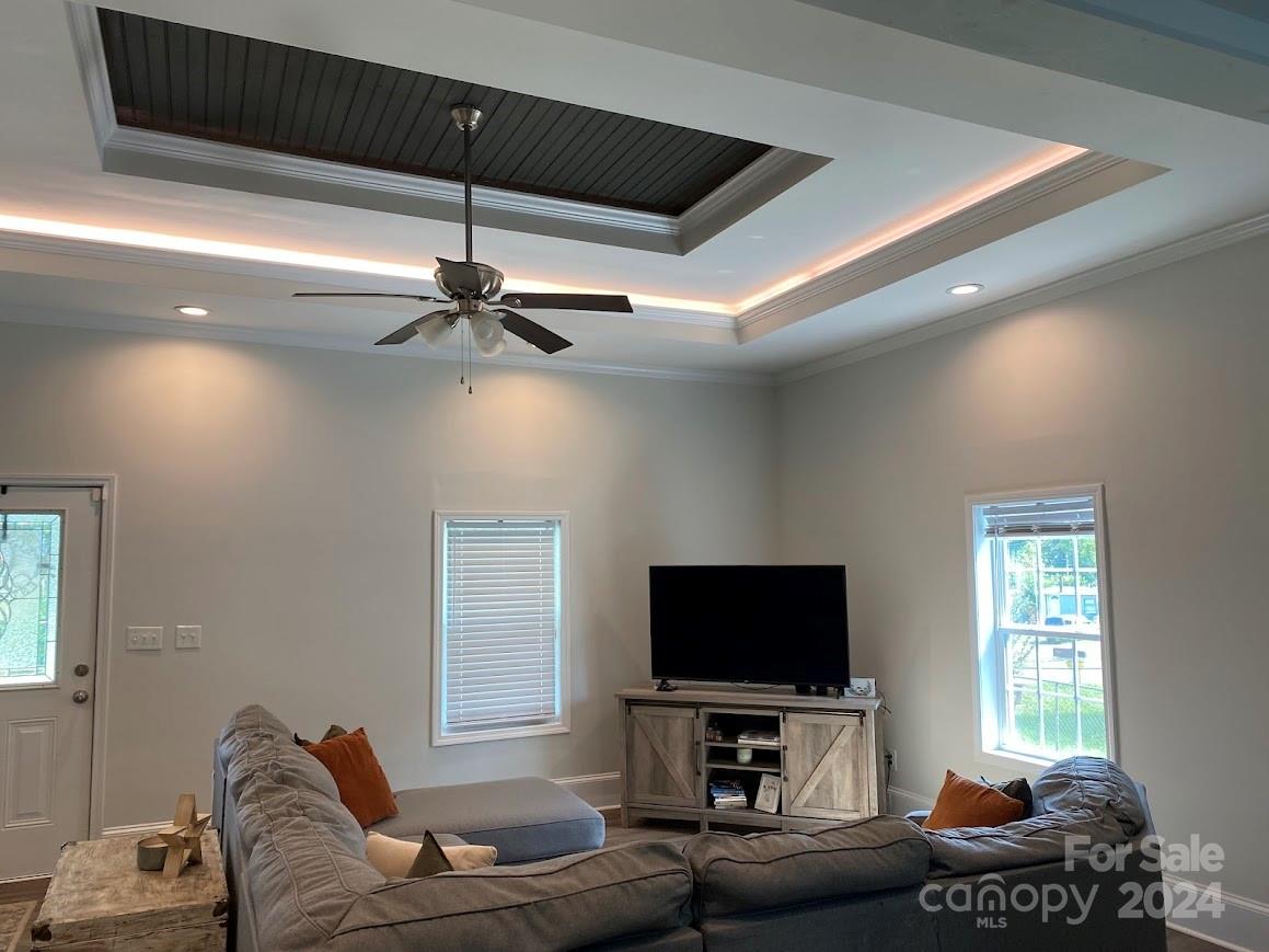 802 McLain Road Kannapolis, NC 28083 - Photo 7 of 20 a living room with furniture and a flat screen tv