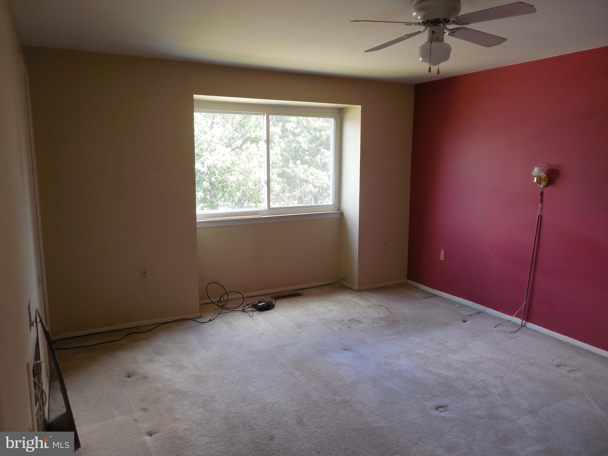 8952 Centerway Road Gaithersburg, MD 20879 - Photo 11 of 22 Primary Bedroom with ceiling fan view 1.