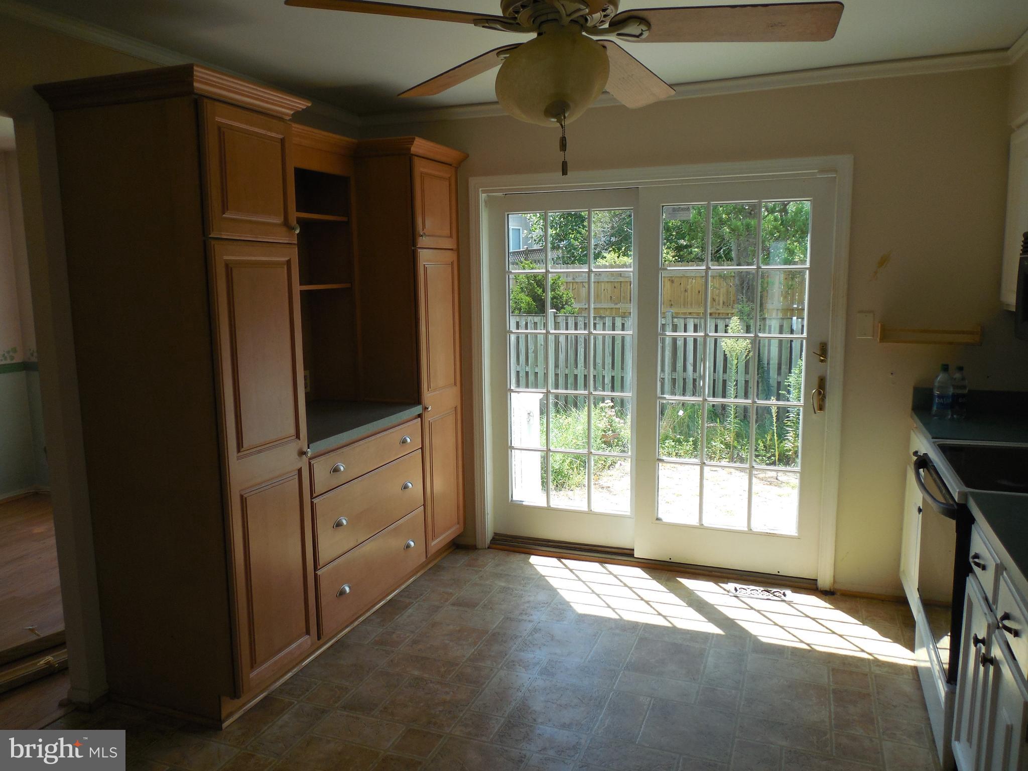 8952 Centerway Road Gaithersburg, MD 20879 - Photo 8 of 22 Kitchen has Sliding Door to fenced backyard.