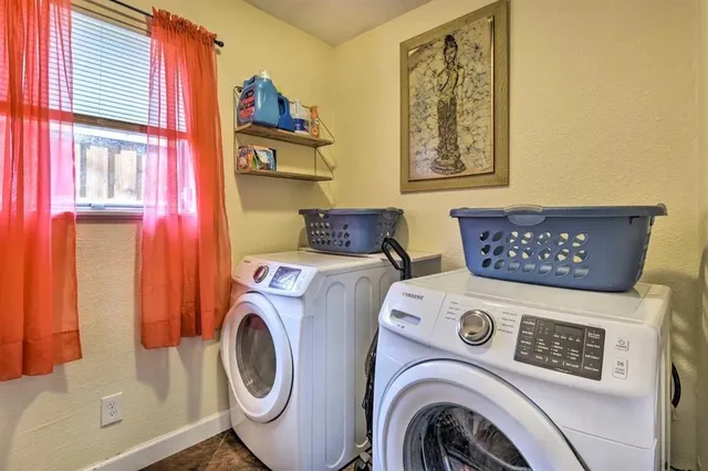 a kitchen with stainless steel appliances granite countertop a stove and a sink