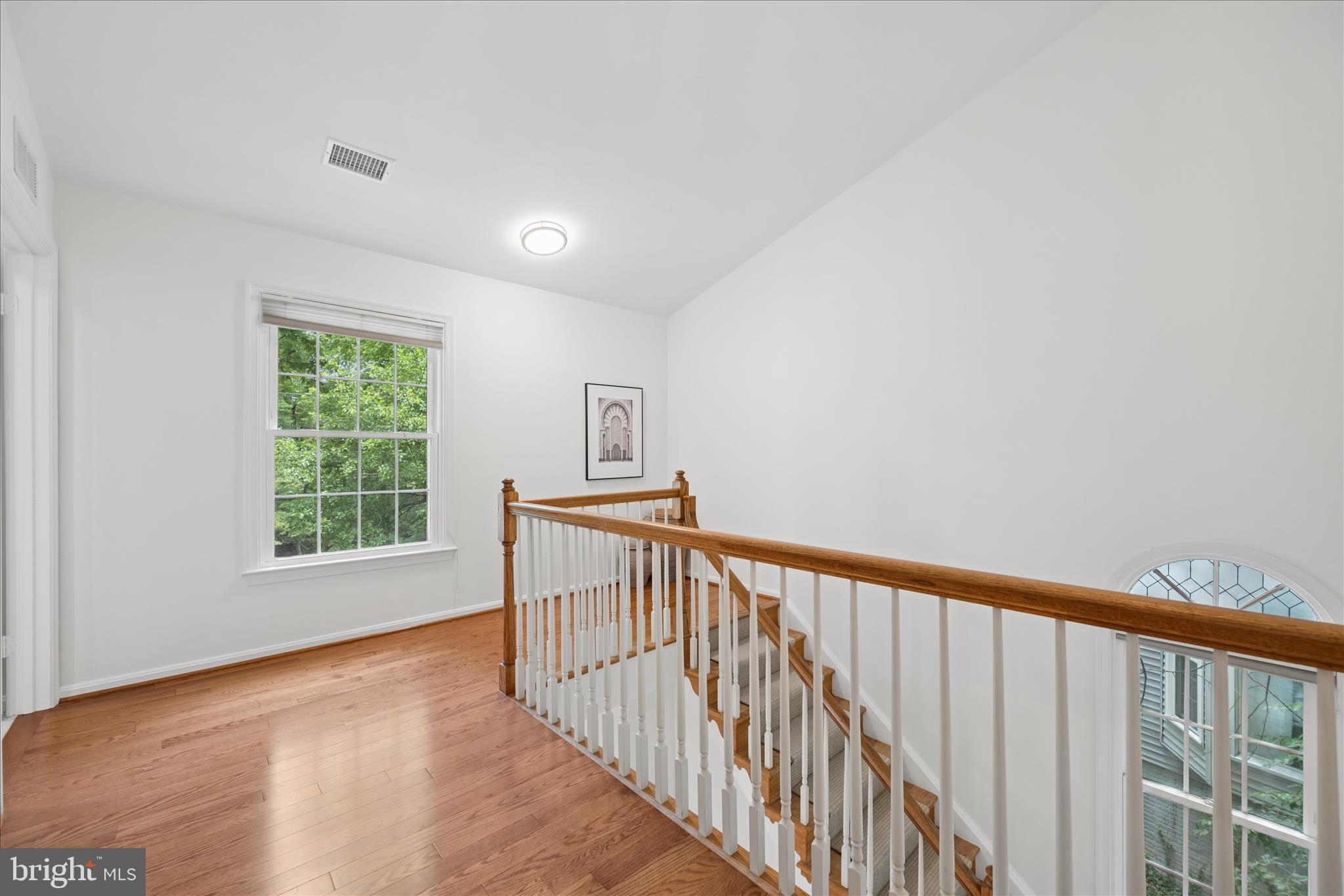 8900 Ellsworth Court Silver Spring, MD 20910 - Photo 50 of 86 Sundrenched lofty upper hallway