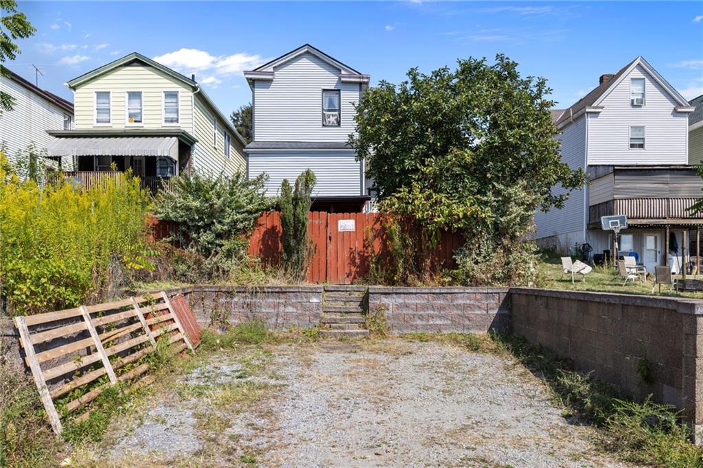 2312 Spring Street Pittsburgh, PA 15210 - Photo 6 of 29 a front view of a house with porch